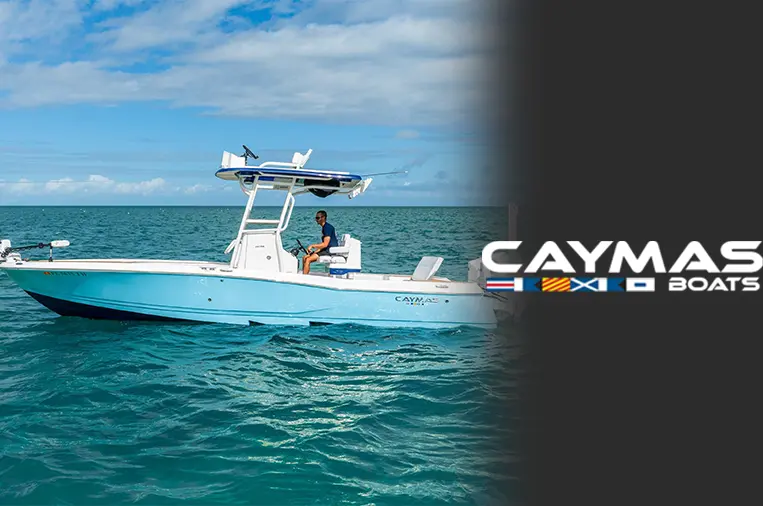 Caymas boat running on turquoise water