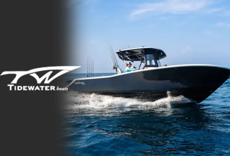 Tidewater boat near shoreline homes